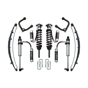 Complete Icon Stage 9 tubular suspension system with shocks, coilovers, leaf springs, and control arms for 2016+ Toyota Tacoma.