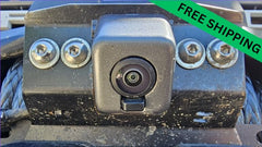 Close-up of Bronco 6G front camera mounted on a metal bracket with winch cable and bolts visible.