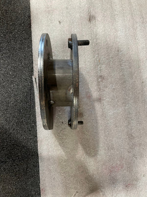 Side view of a scratch-and-dent metal spacer plate for FZJ80 front suspension, no hardware included.