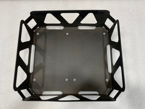 Top view of a black metal utility basket with geometric cutouts and handles on two sides.