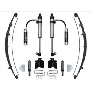 Complete Icon Stage 2 rear suspension system for 2005 and up Toyota Tacoma, including shocks, leaf springs, and mounting hardware.