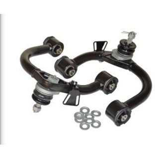 Pair of black upper control arms with bushings and mounting hardware for Land Cruiser LX470 suspension upgrade.