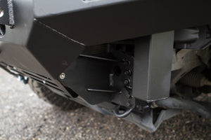 Close-up of black Metal Tech Fortress front bumper mounting bracket on 5th Gen 4Runner (2014-2019) showing bolts and welds.