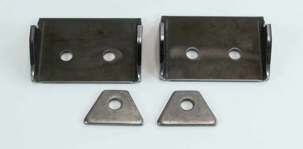 Installed Metal Tech FJ40 Land Cruiser seat cradle system kit with black racing seat and roll cage inside vehicle.