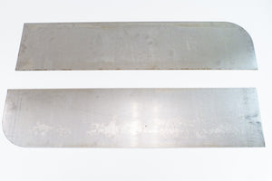 Two raw metal panels with rounded edges, components for FJ40 Land Cruiser tube fender kit.