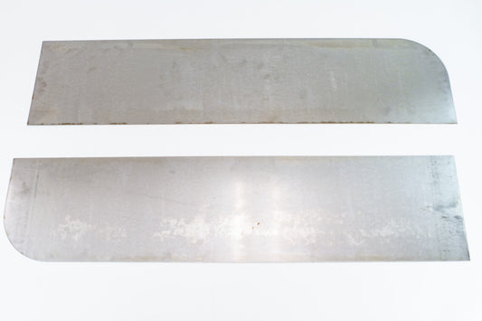 Two raw metal panels with rounded edges, components for FJ40 Land Cruiser tube fender kit.