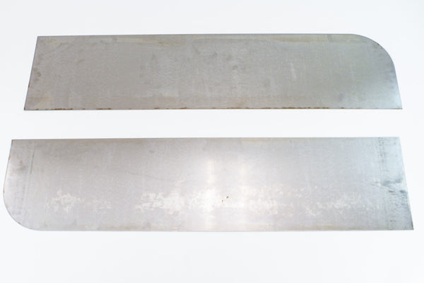 Two raw metal panels with rounded edges, components for FJ40 Land Cruiser tube fender kit.