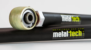 Close-up of black Metal Tech adjustable rear lower link with bushing for 80 Series Land Cruiser and Lexus LX450.