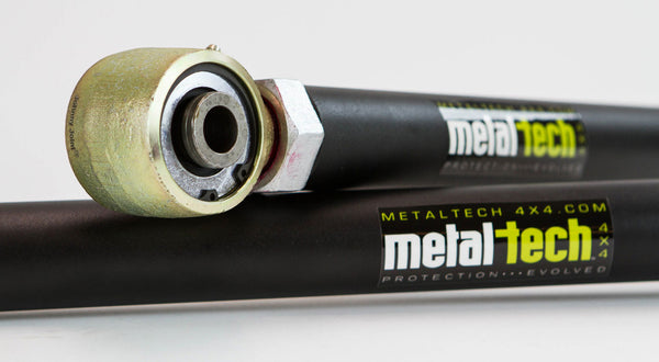 Close-up of black Metal Tech adjustable rear lower link with bushing for 80 Series Land Cruiser and Lexus LX450.