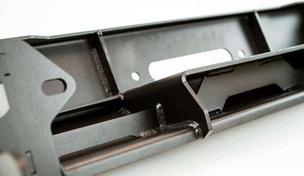 Close-up of black powder-coated steel welds on Metal Tech FJ Cruiser Stronghold winch bumper frame.