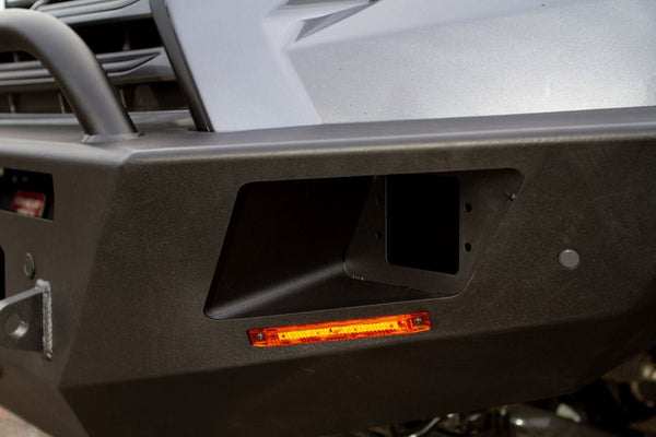 Close-up of black Metal Tech Tiger Shark front bumper with amber marker light installed on Lexus GX460.