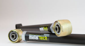 Close-up of Metal Tech 2001-2007 Sequoia offset rear lower links with black bars and gold-toned rod ends.