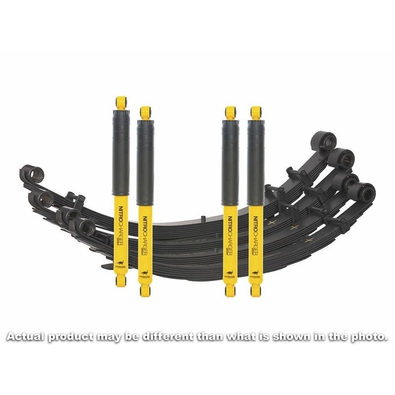 Yellow and black 2-inch sport suspension kit with leaf springs and shocks for 80-89 FJ60 Land Cruiser.