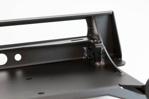 Close-up of black steel welds and mounting bracket on MetalTech 4x4 Stronghold winch bumper for 2014 4Runner.