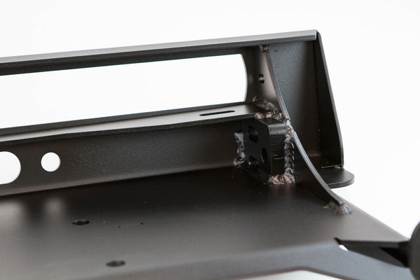 Close-up of black steel welds and mounting bracket on MetalTech 4x4 Stronghold winch bumper for 2014 4Runner.