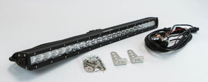 120W single-row LED light bar with spot and flood lenses, mounting brackets, screws, and wiring harness on white background.