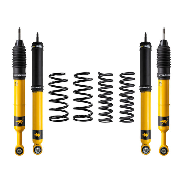 Yellow and black Nitrocharger shock absorbers with four black coil springs for 2-inch lift suspension kit.