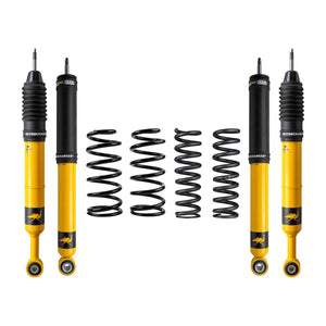 Yellow and black Nitrocharger Plus shocks with black coil springs for 2010 Lexus GX460 2.5-inch lift kit.