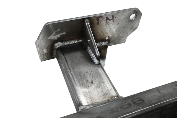Close-up of welded steel bracket detail on 2021 Bronco 4-door Sidewinder rock slider mount.