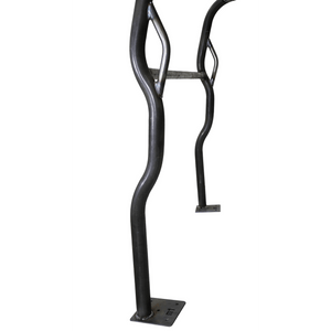 Close-up of black metal roll cage kit tubing with welded mounting plates for FJ40 Land Cruiser.