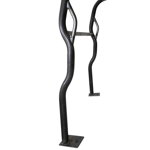 Close-up of black metal roll cage kit tubing with welded mounting plates for FJ40 Land Cruiser.