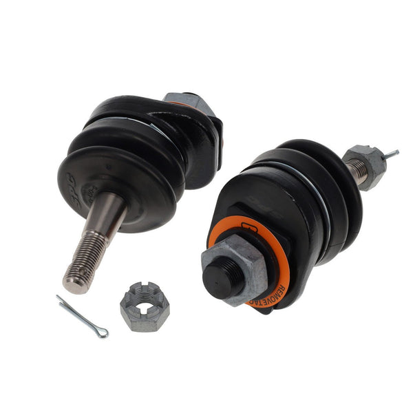 Two black replacement ball joints with metal studs, nuts, and cotter pins on a white background.