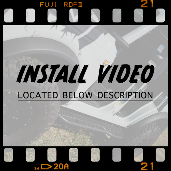 Text overlay reading "Install video located below description" over a partially visible 2021 Ford Bronco 4-door with rock sliders installed.