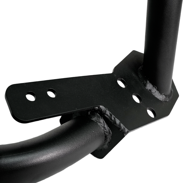 Close-up of black metal bracket and welded tube section on FJ Cruiser front tube bumper.