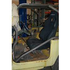 Installed Metal Tech FJ40 Land Cruiser seat cradle system kit with black racing seat and roll cage inside vehicle.